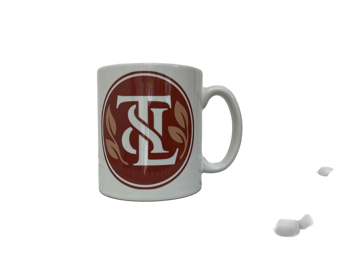 Ceramic white mug cup  with our unique 
Logo T&L 
For our Dementia Education Hub 