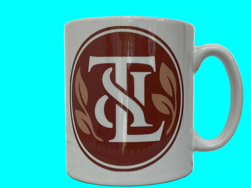 Ceramic white mug cup  with our unique 
Logo T&L 
For our Dementia Education Hub 